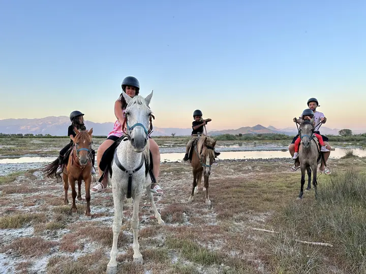 A group ride, lake behind